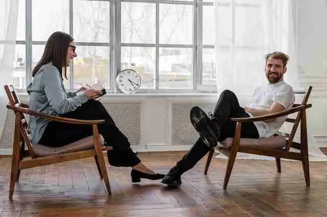 woman giving emotional support to a man who has to deal with a difficult person