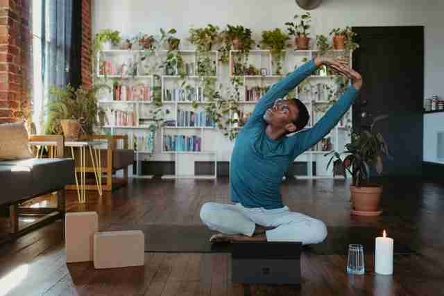 young man doing yoga for self-care