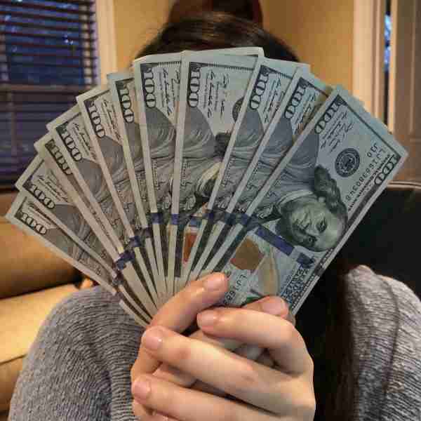 Person holding money
