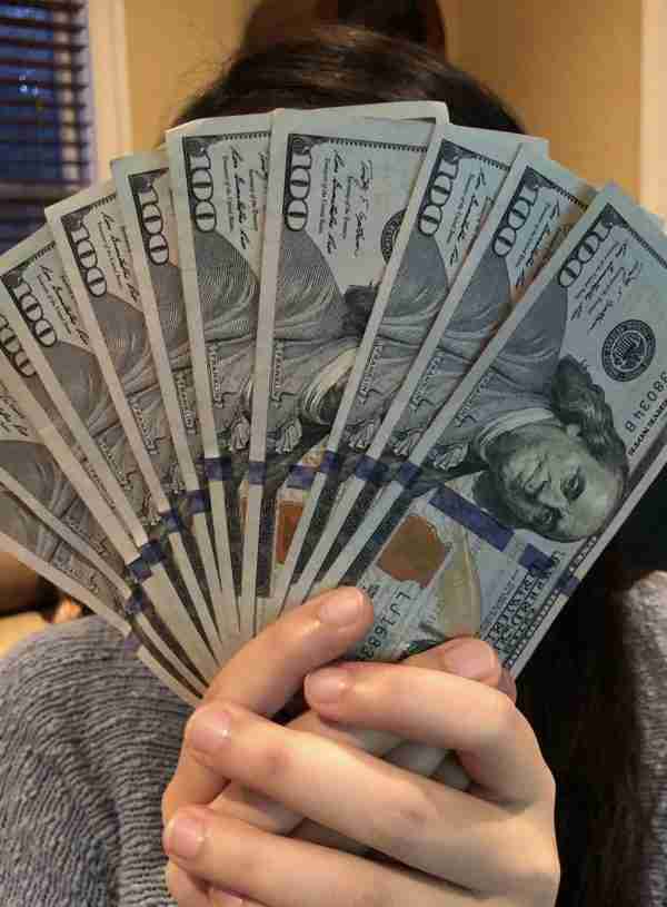Person holding money