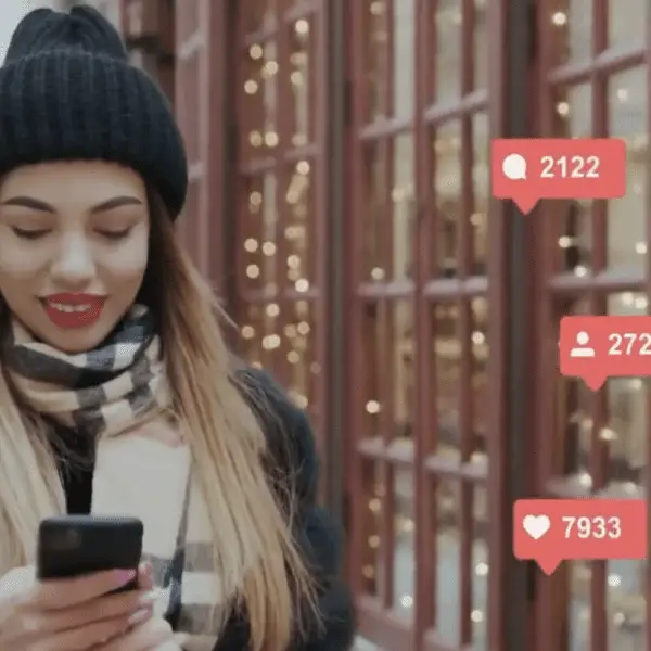 Woman walking down the street checking likes