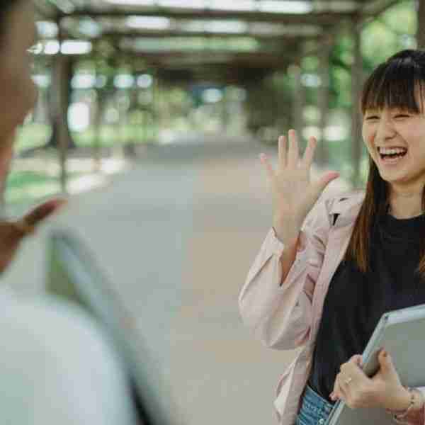 woman waving - signs that you need new friends