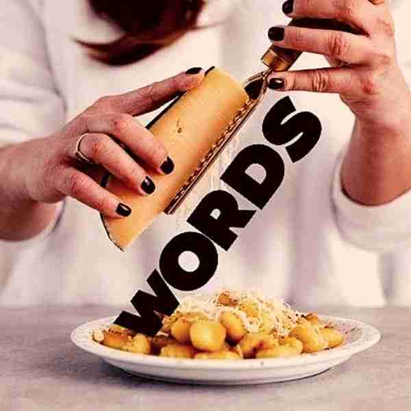 woman grating cheese that comes out as words