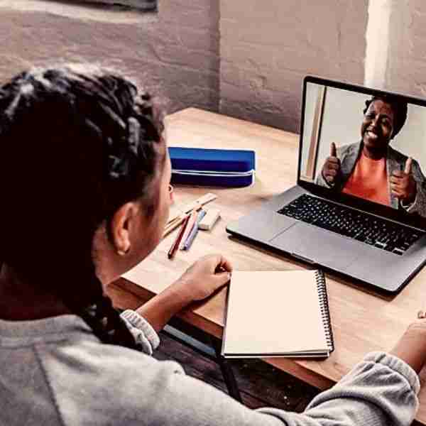 girl online using laptop to access self-coaching tools