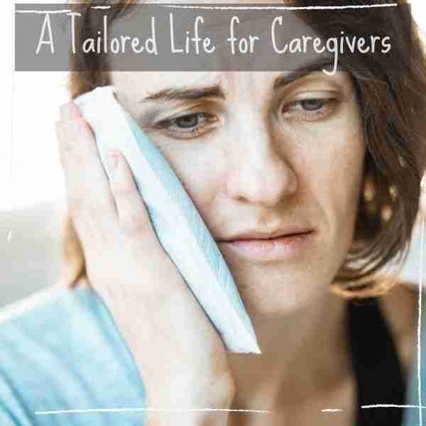 woman holding ice pack to her face due to temporomandibular joint dysfunction self care square