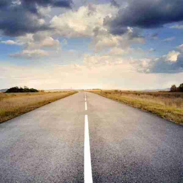 a road with a cloudy background the figurative road to a positive life