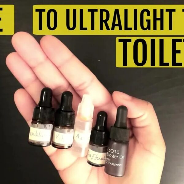 hand holding mini toiletries